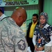 Service members work with Iraqi businesses