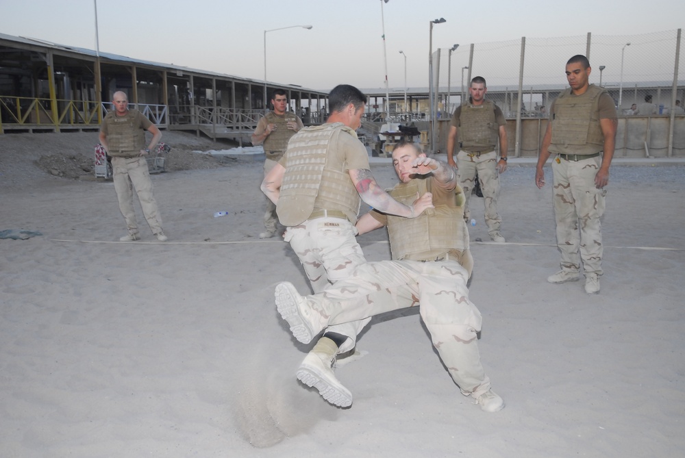 Seabees practice hand to hand combat