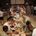 Gearing up for school: Airmen donate supplies to Iraqi children