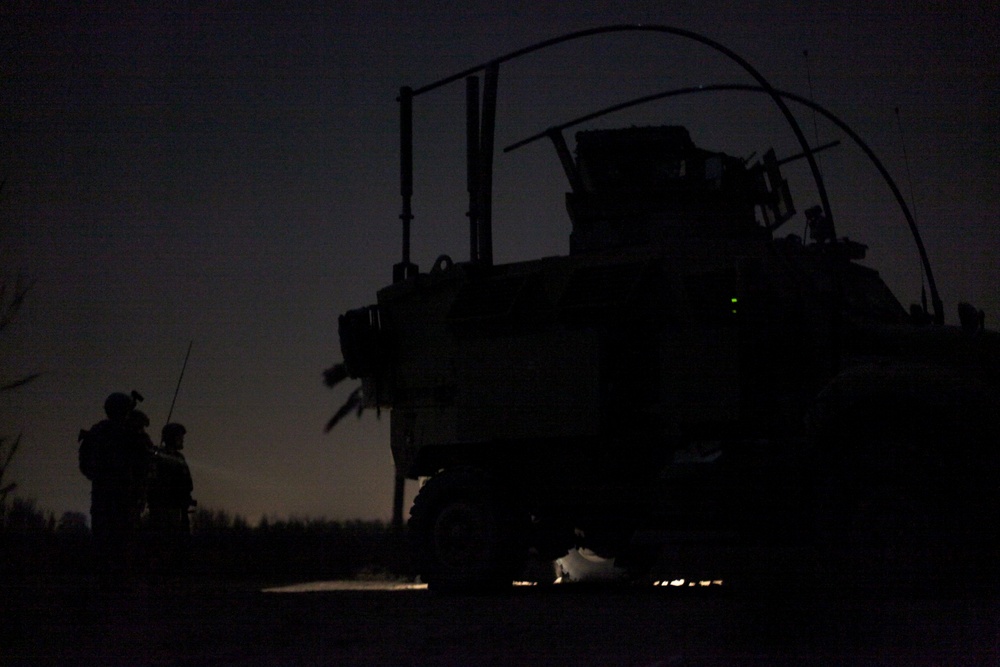 Cavalry soldiers conduct night patrol