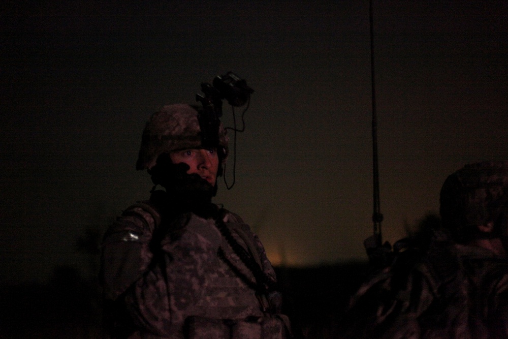 Cavalry soldiers conduct night patrol