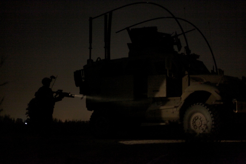 Cavalry soldiers conduct night patrol