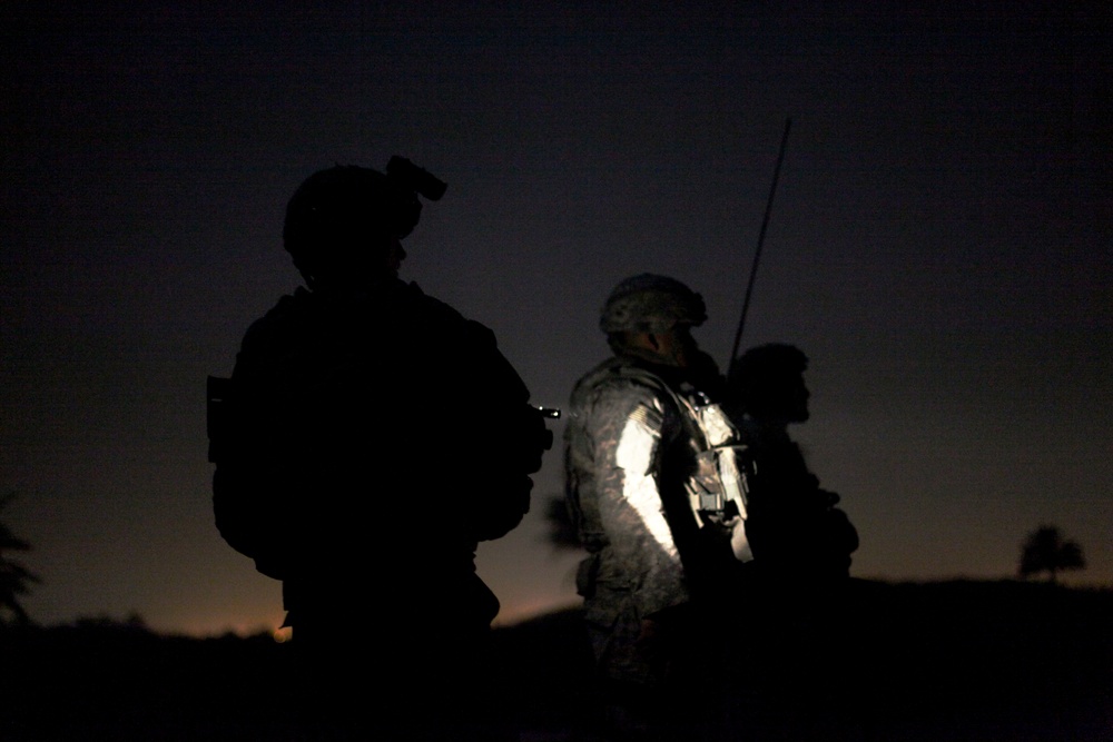 Cavalry soldiers conduct night patrol