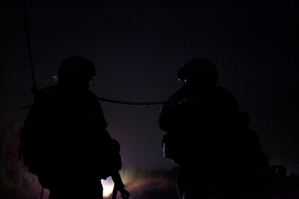 Cavalry soldiers conduct night patrol