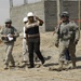 Soldiers hand out toys, check on police station project