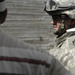 Soldiers hand out toys, check on police station project