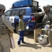 Soldiers hand out toys, check on police station project