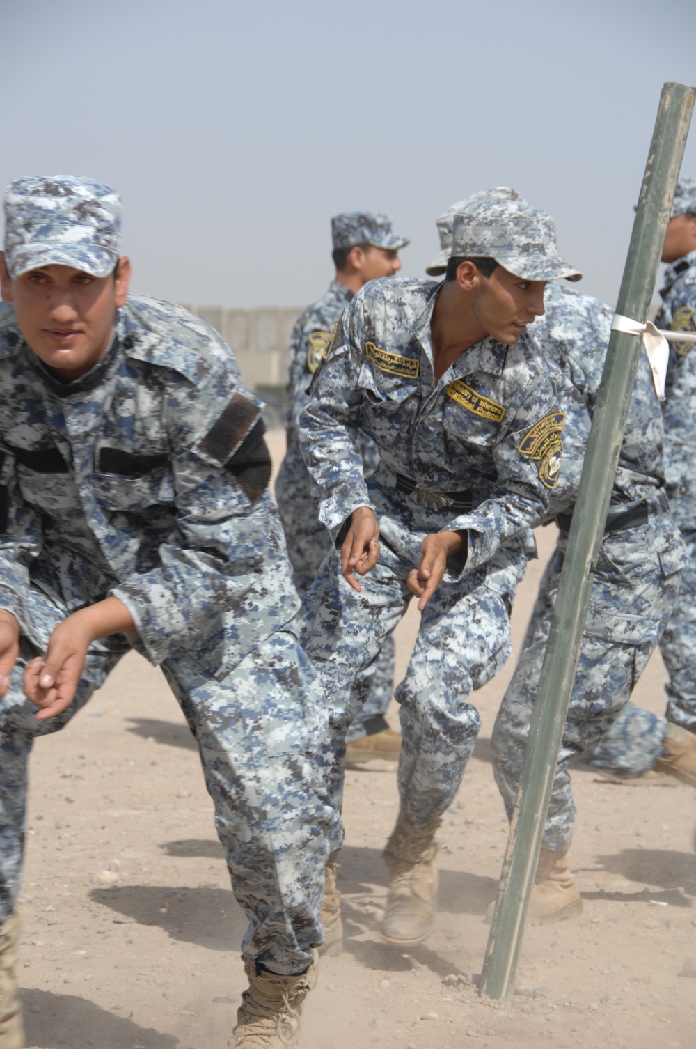 Iraqi police practice room clearing techniques