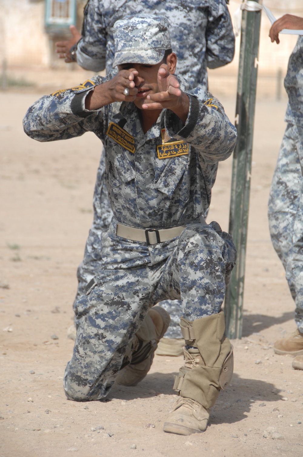 Iraqi police practice room clearing techniques