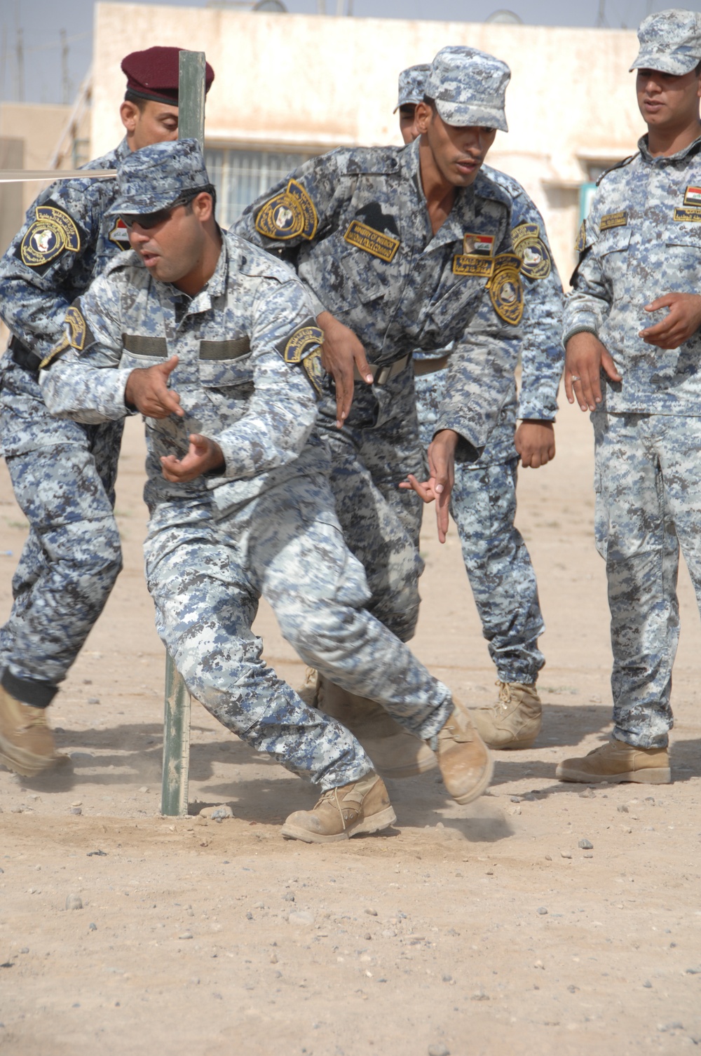 Iraqi police practice room clearing techniques