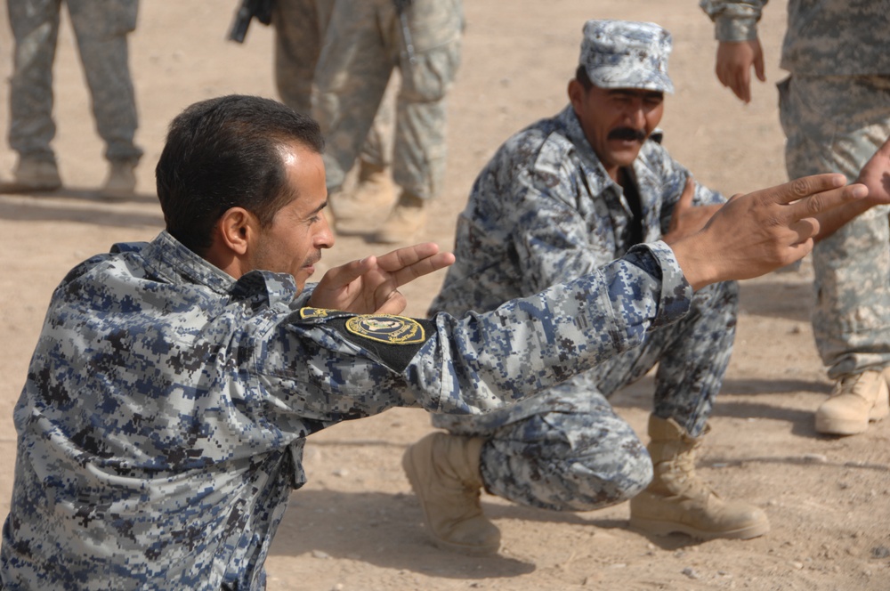 Iraqi police practice room clearing techniques