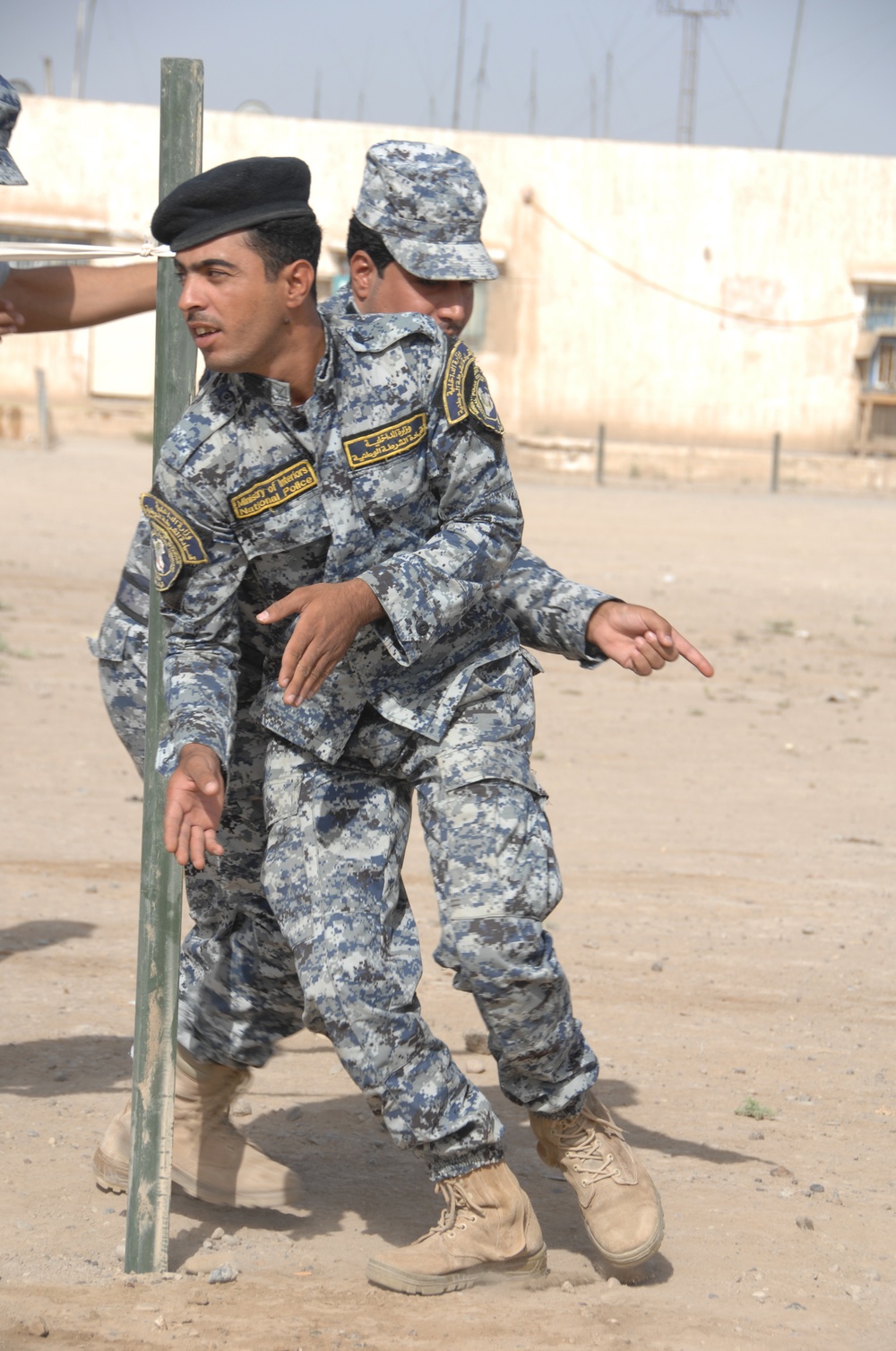 Iraqi police practice room clearing techniques