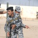 Iraqi police practice room clearing techniques