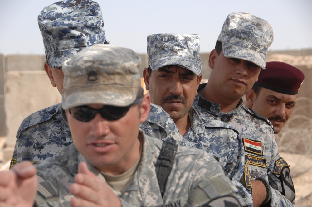 Iraqi police practice room clearing techniques