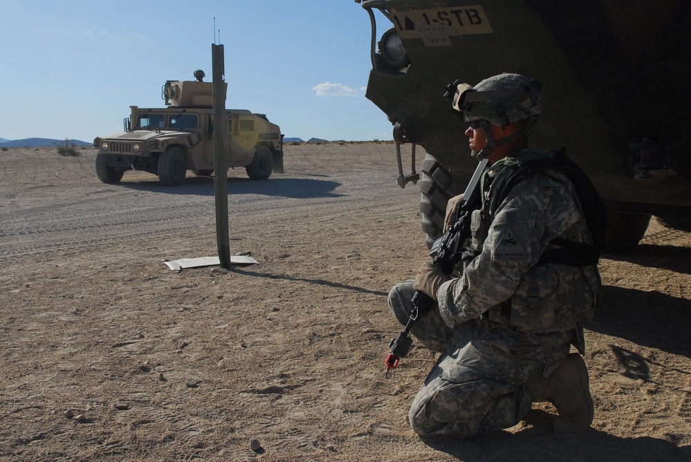 'Ready First Brigade' Troops Prepare for Deployment at National Training Center