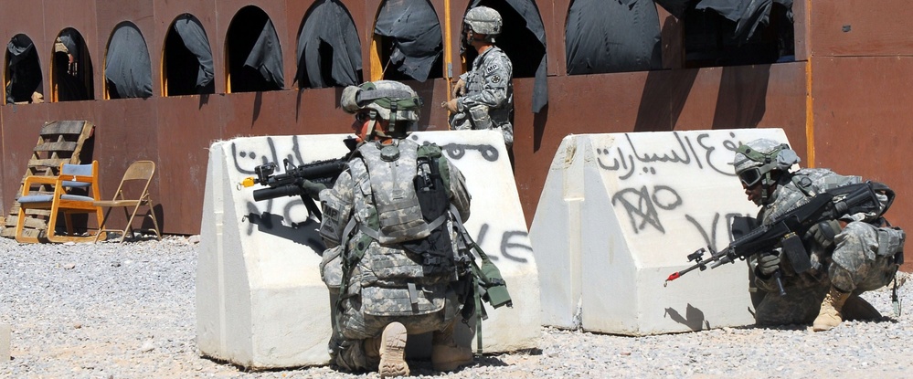 'Ready First Brigade' Troops Prepare for Deployment at National Training Center