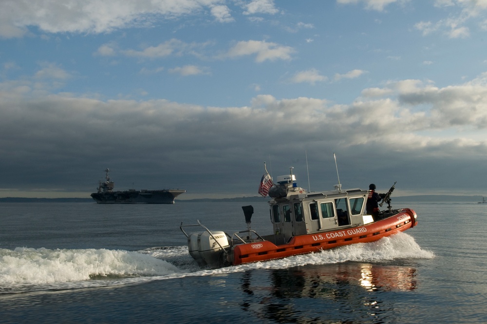 Coast Guard Crew Escorts USS John C. Stennis
