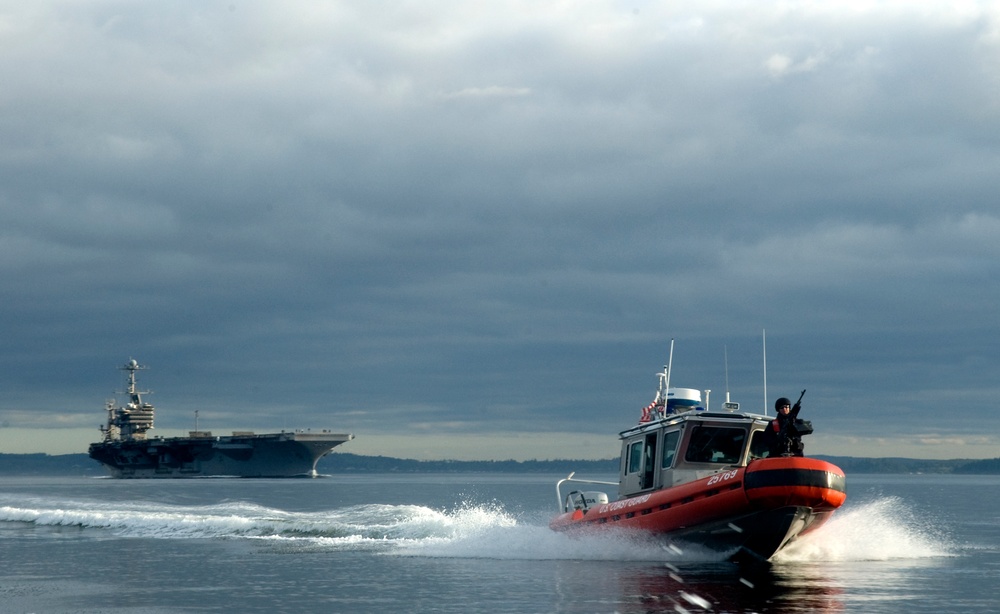 Coast Guard Crew Escorts USS John C. Stennis