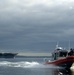 Coast Guard Crew Escorts USS John C. Stennis