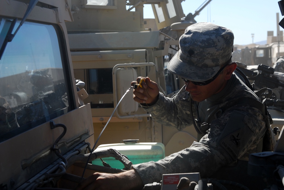 Soldier Conducts Maintenance