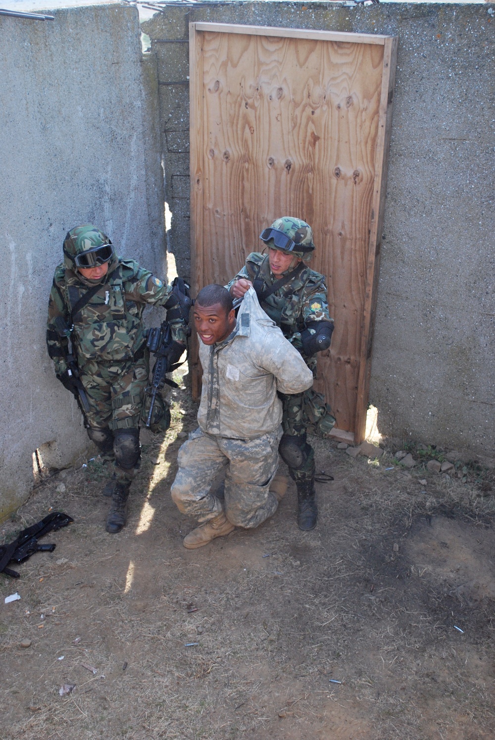 U.S. and Bulgarian Forces Conduct Raid Training on a Mock Village With Strykers at Novo Selo Training Area