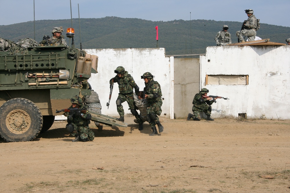 U.S. and Bulgarian Forces Conduct Raid Training on a Mock Village With Strykers at Novo Selo Training Area