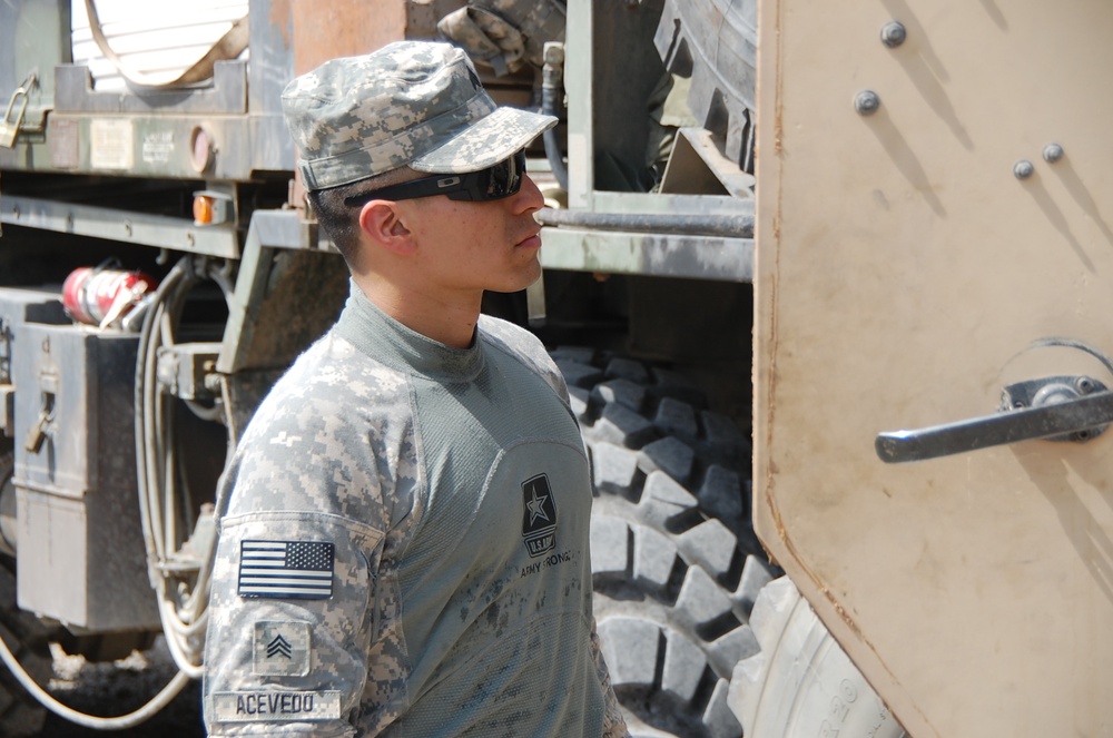Soldiers prepare for a combat logistics convoy mission