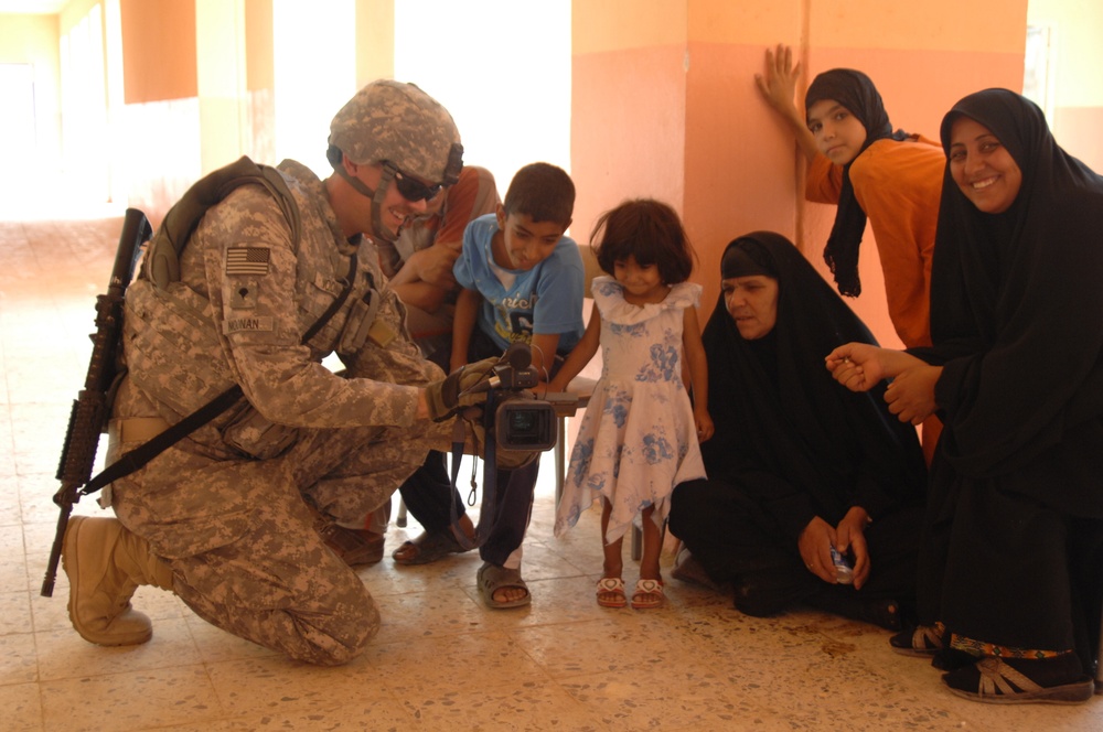 Reconstruction team visits Zain Bin Ali School
