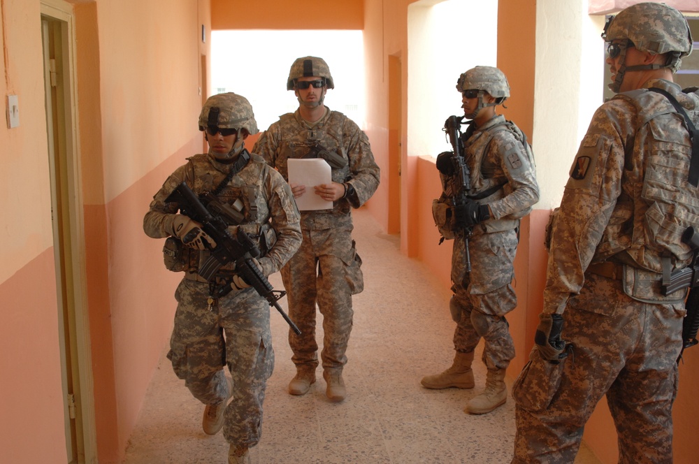 Reconstruction team visits Zain Bin Ali School