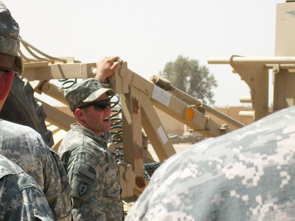 Non-Commissioned Officer Receives Battlefield Promotion