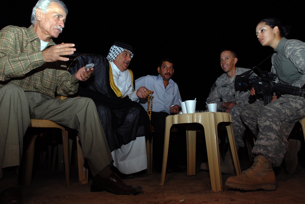Soldiers Break Ramadan Fasting With Locals