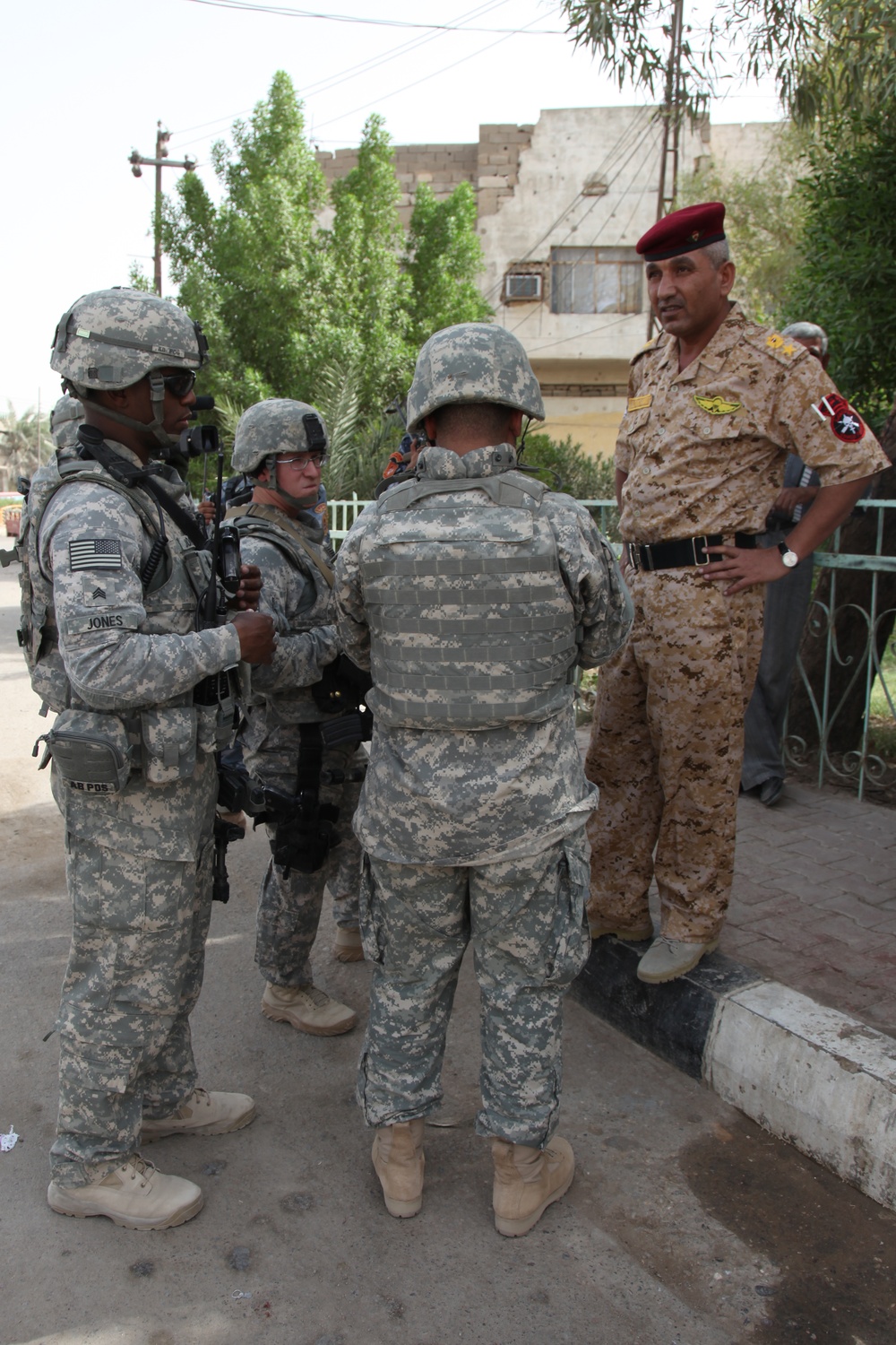 Soldiers speak to Iraqi's about U.S. presence