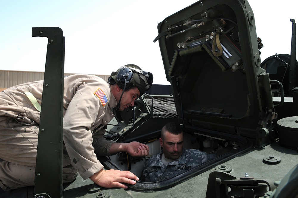 Soldiers Explore Stryker Facility at Qatar Base
