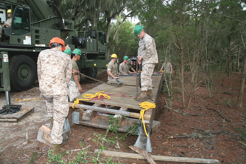 Marine Wing Support Squadron 273 bridges together