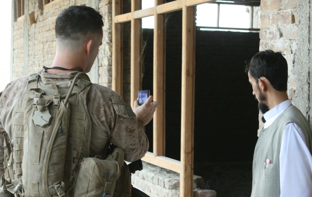 Marines facilitate upgrade of distribution center to accommodate 400 tons of wheat seed