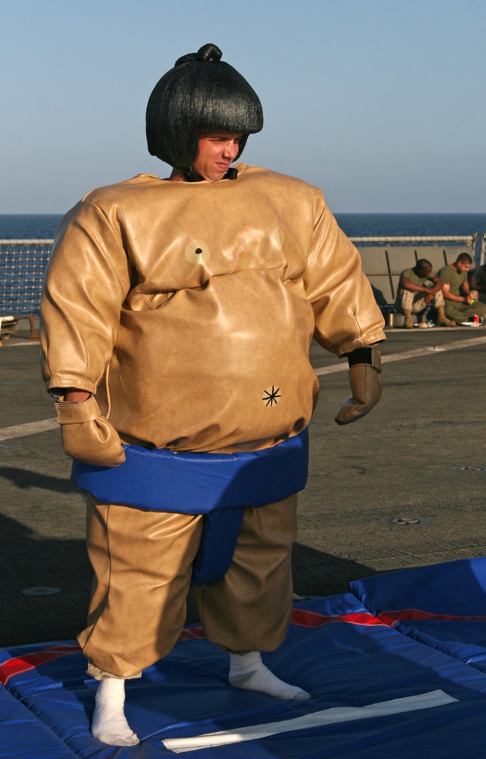 22nd MEU Marines, USS Fort McHenry Sailors enjoy 'Steel Beach' picnic