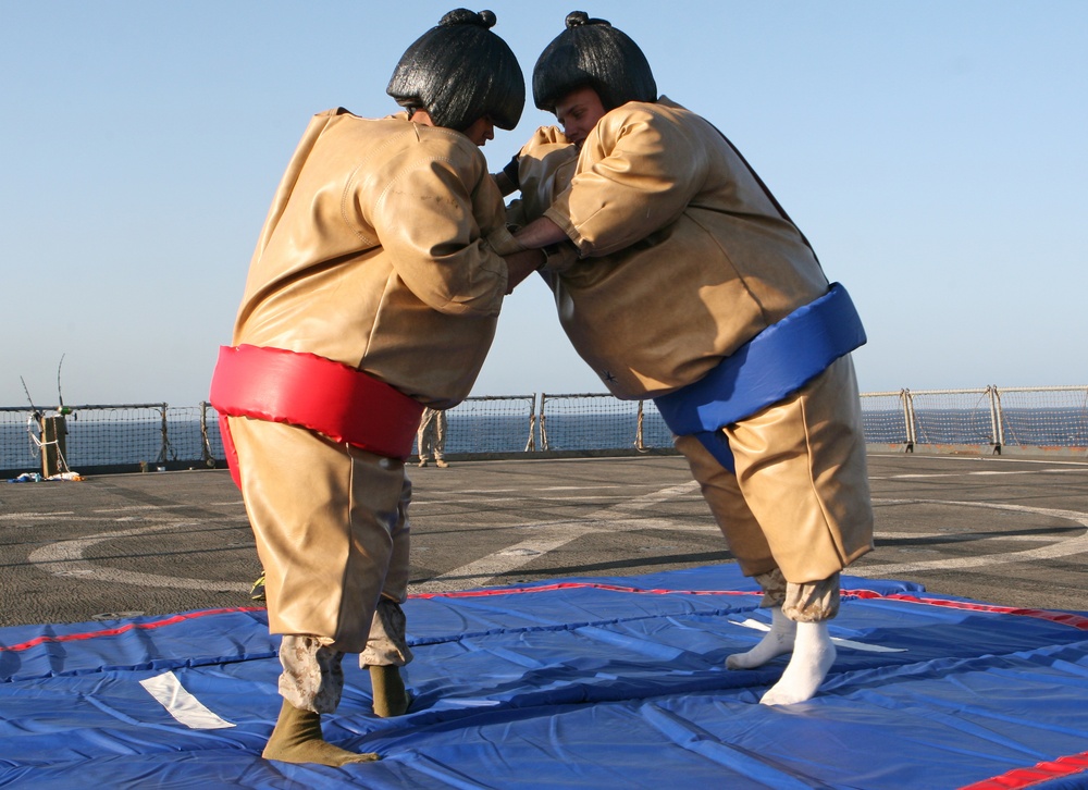 22nd MEU Marines, USS Fort McHenry Sailors enjoy 'Steel Beach' picnic