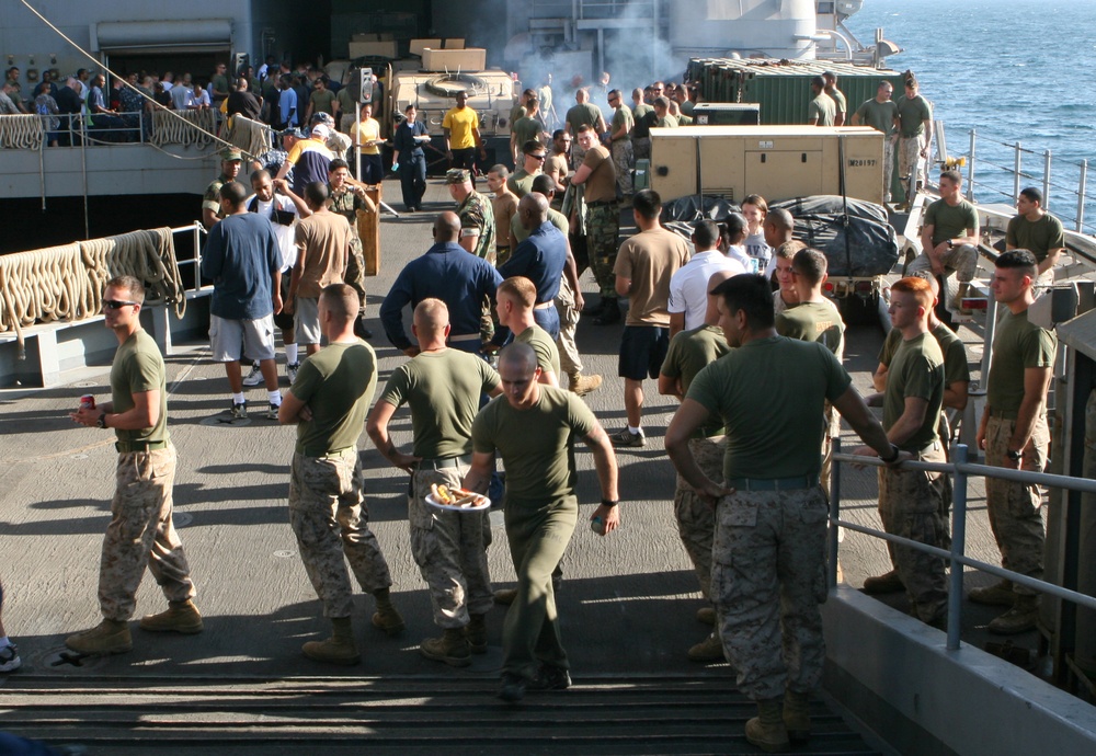 22nd MEU Marines, USS Fort McHenry Sailors enjoy 'Steel Beach' picnic