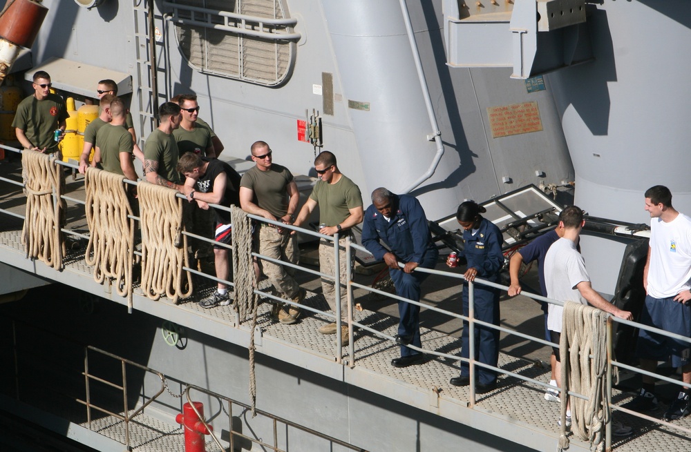 22nd MEU Marines, USS Fort McHenry Sailors enjoy 'Steel Beach' picnic