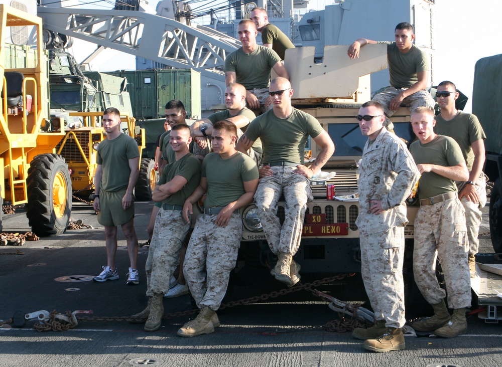 22nd MEU Marines, USS Fort McHenry Sailors enjoy 'Steel Beach' picnic