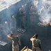 22nd MEU Marines, USS Fort McHenry Sailors enjoy 'Steel Beach' picnic