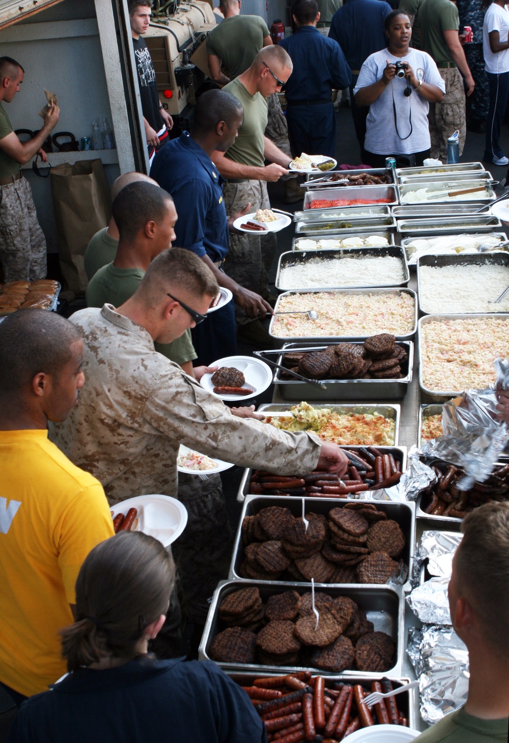 22nd MEU Marines, USS Fort McHenry Sailors enjoy 'Steel Beach' picnic