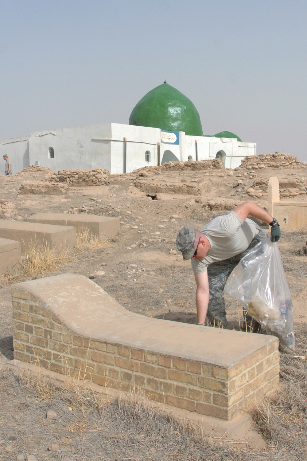 Shrine, Cemetery Cleanup Strengthens U.S., Iraqi Airmen Relations