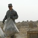 Shrine, Cemetery Cleanup Strengthens U.S., Iraqi Airmen Relations