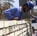 Soldiers check up on the Said Dikil school construction site