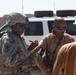 Soldiers check up on the Said Dikil school construction site