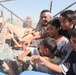 Soldiers check up on the Said Dikil school construction site