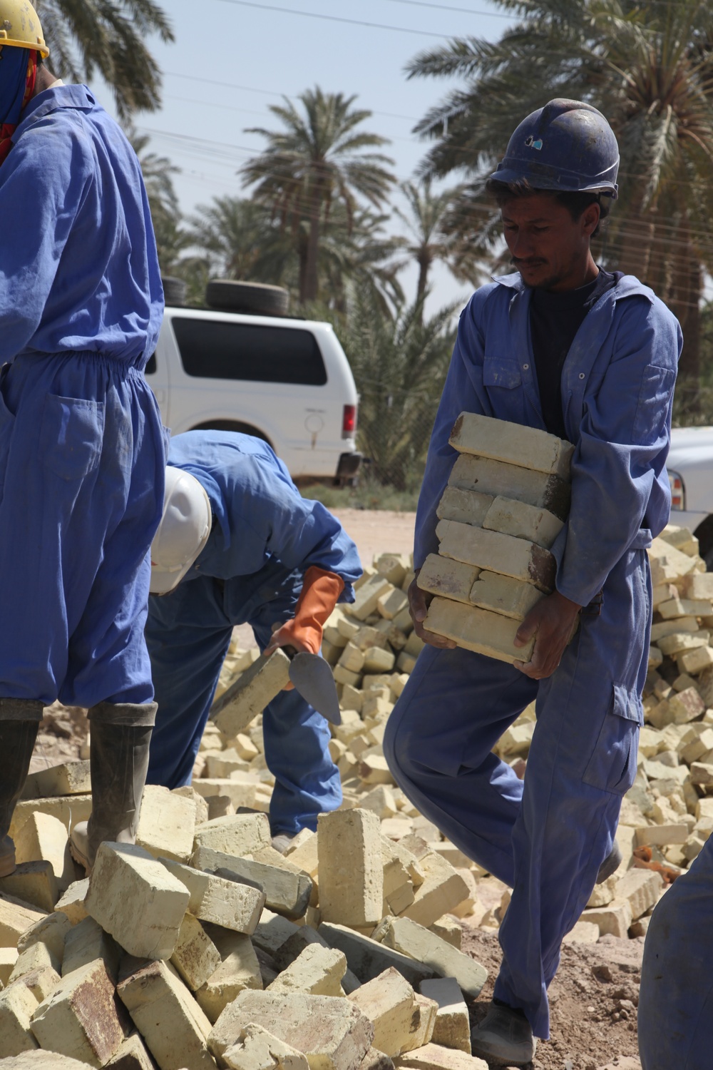 Soldiers check up on the Said Dikil school construction site