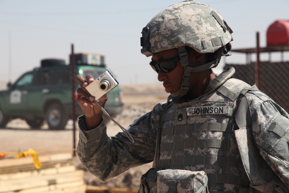 Soldiers check up on the Said Dikil school construction site