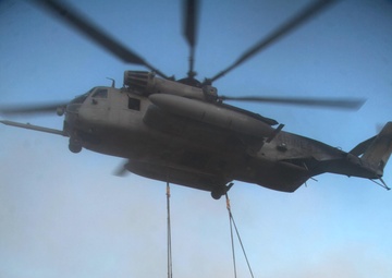 Air-Ground team airlifts newest howitzers in historic first